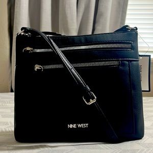 Nine West black/ silver tone crossbody is perfect for any stylish occasion!